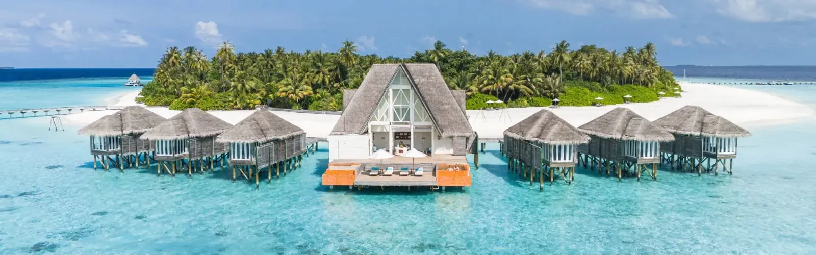 The overwater spa pavilion at Anantara Kihavah Maldives Villas, Baa Atoll — inside the UNESCO Biosphere Reserve.
